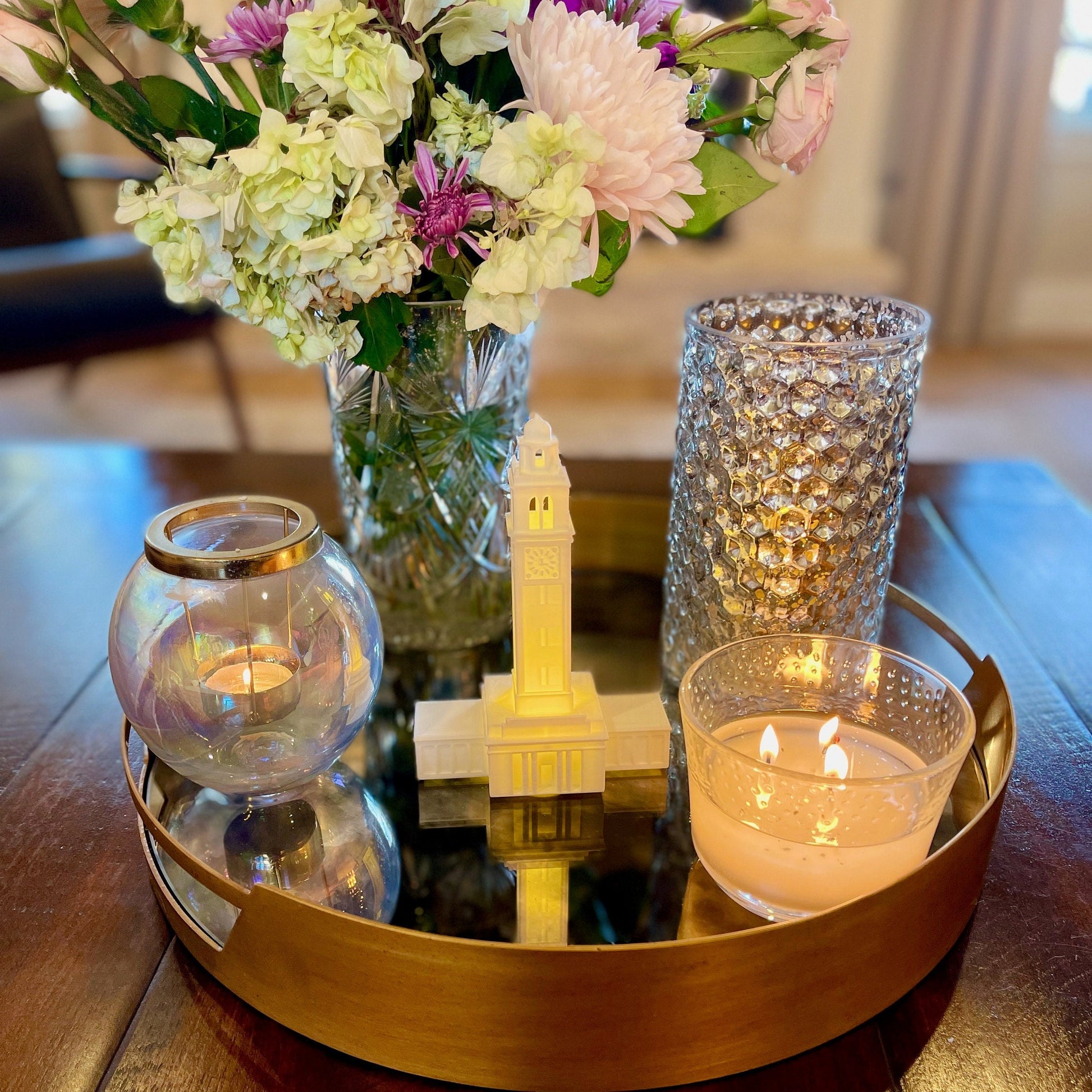 The LSU light, used as home decor and shown styled on a living room tray.