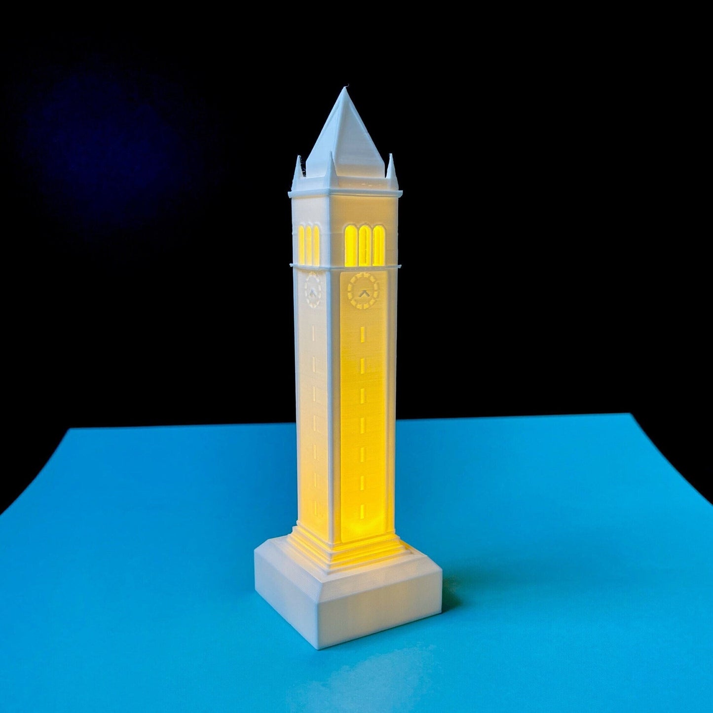 The UC Berkeley lighted figurine, shown against a blue background.