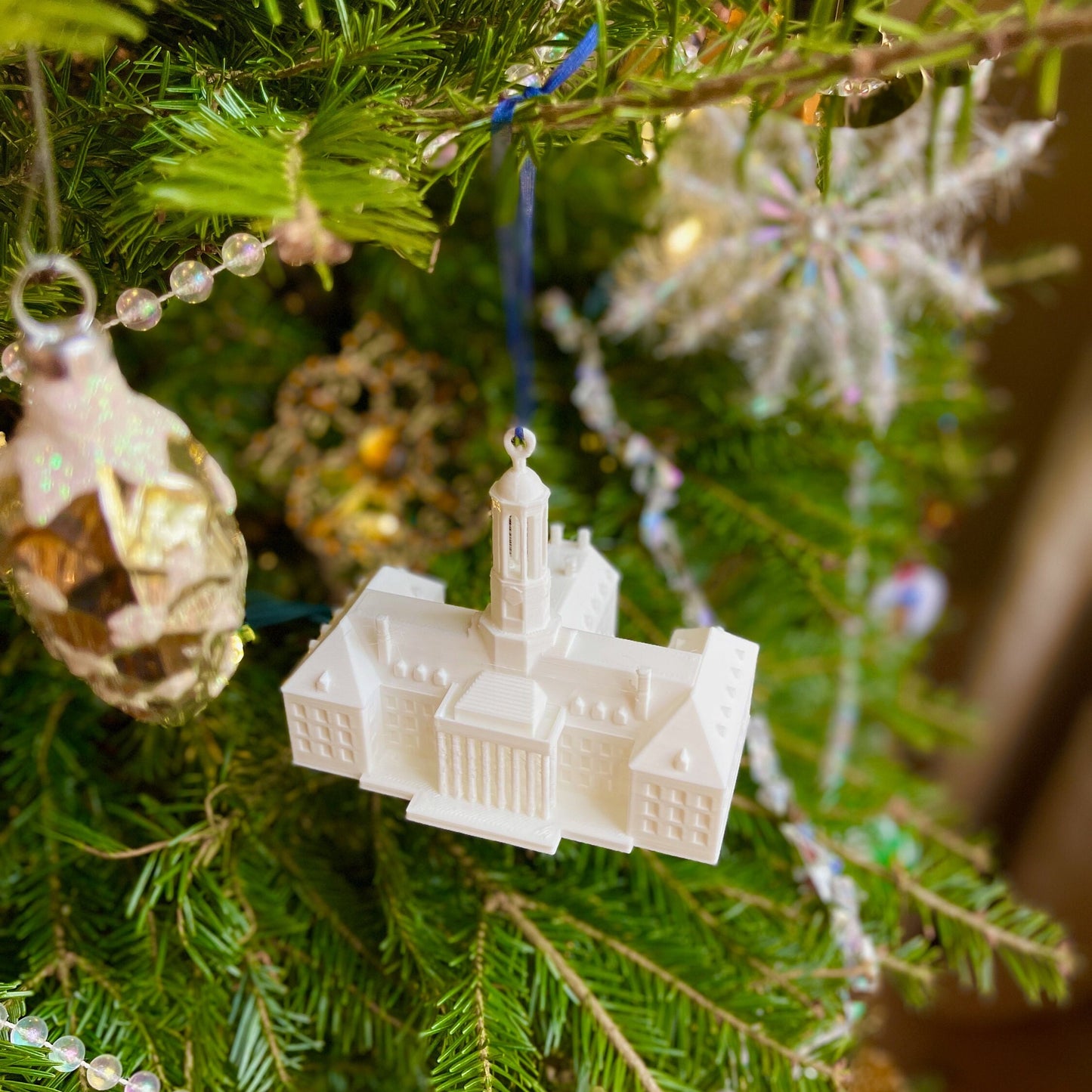 The Old Main ornament, shown on a Penn State tree.