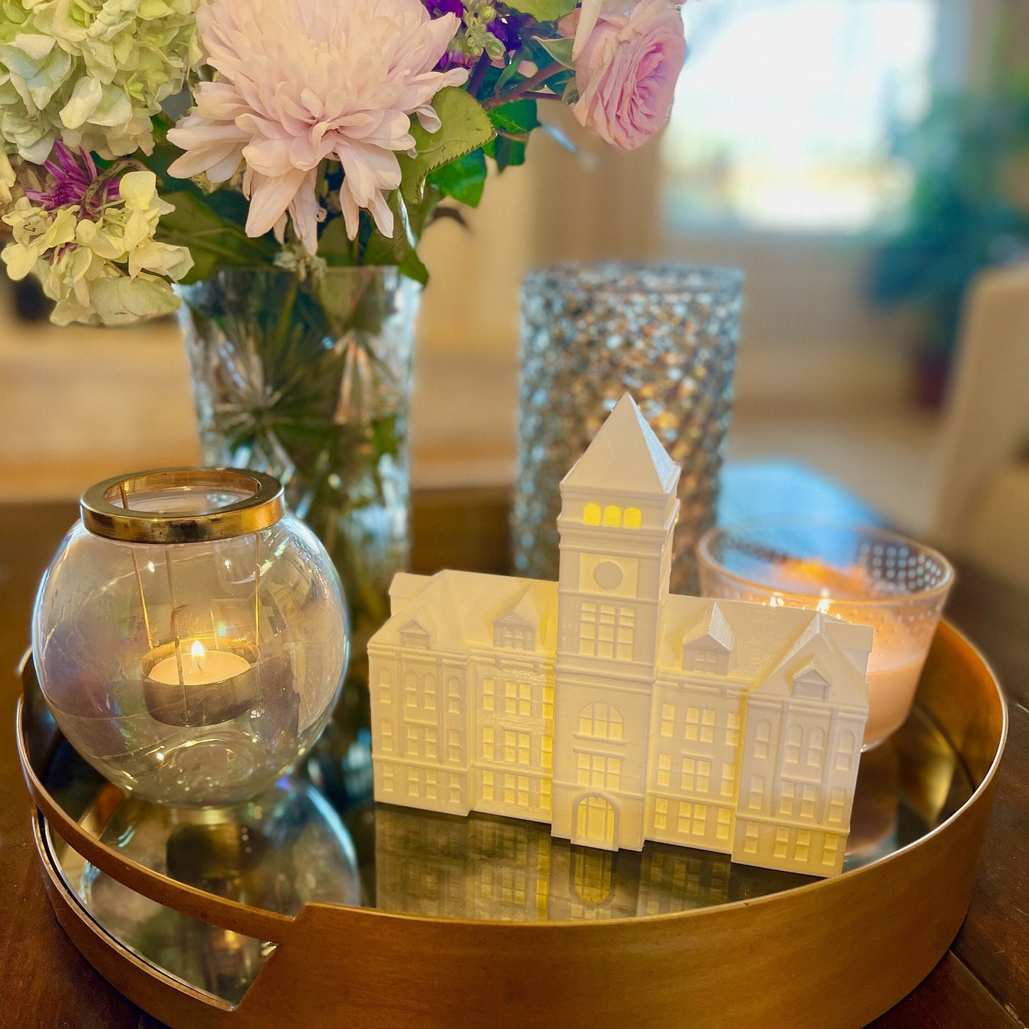 The 3D printed Tillman Hall light, shown on a living room side table.