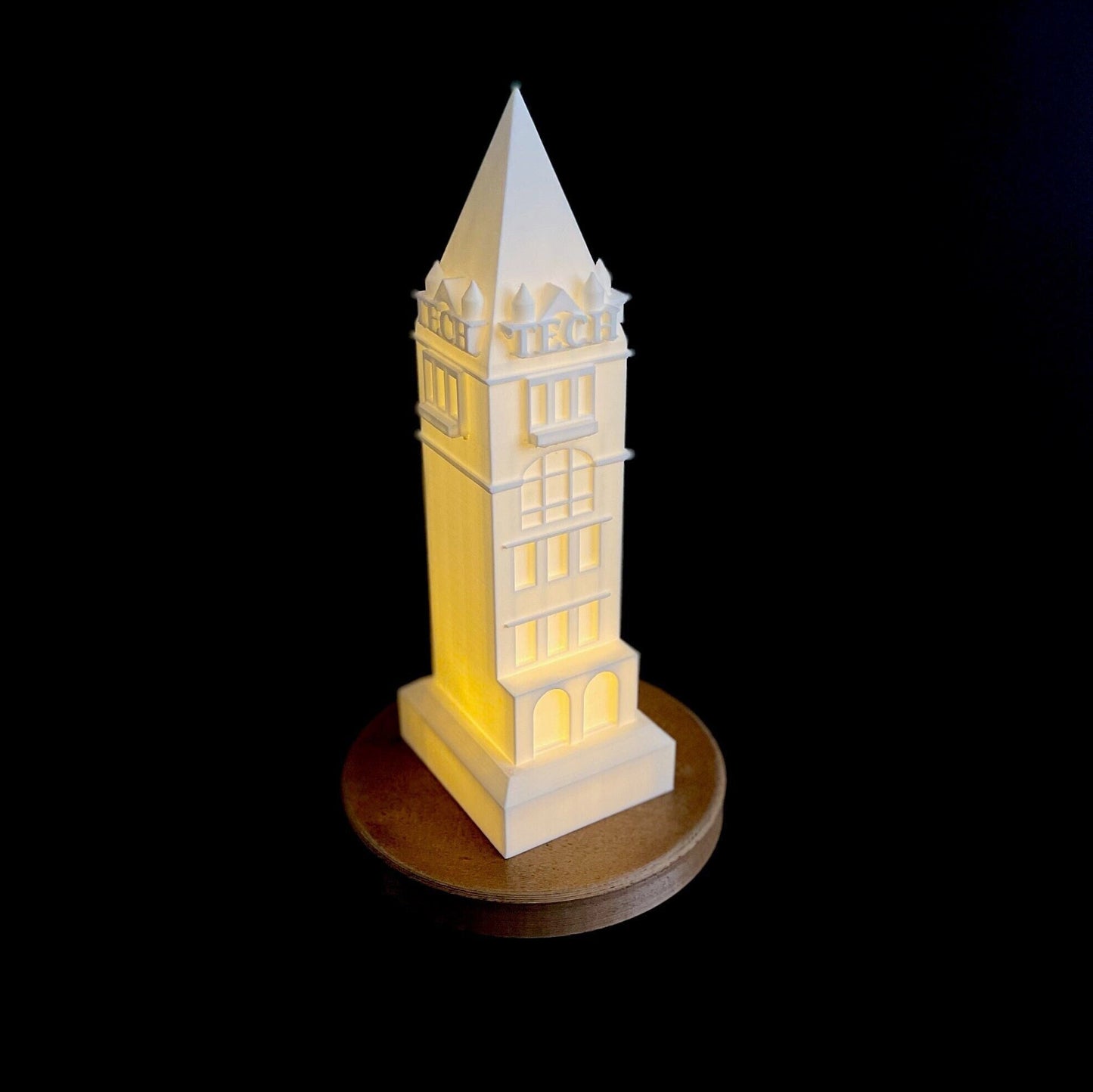 The Georgia Tech Tower lamp, shown against a black background.