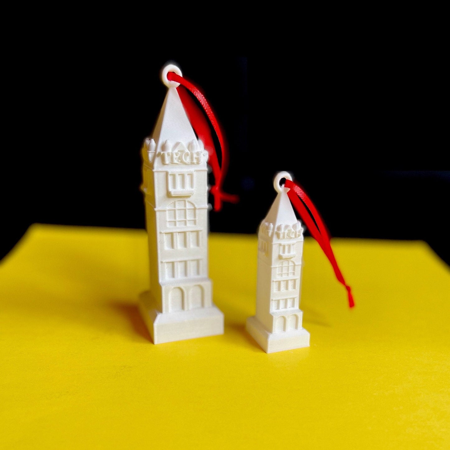 Georgia Tech ornaments, tied with a red ribbon.