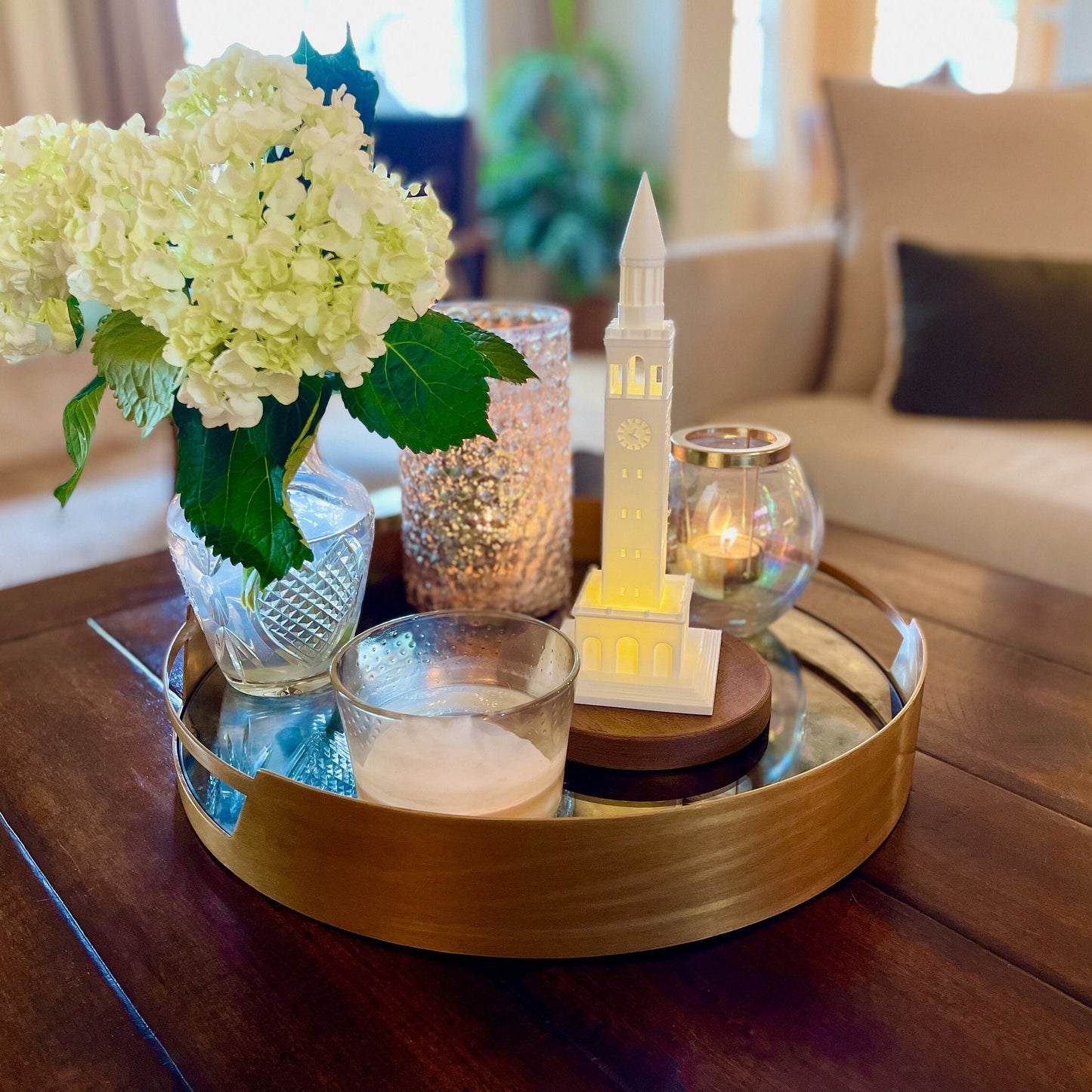 The UNC light, shown styled in a living room.