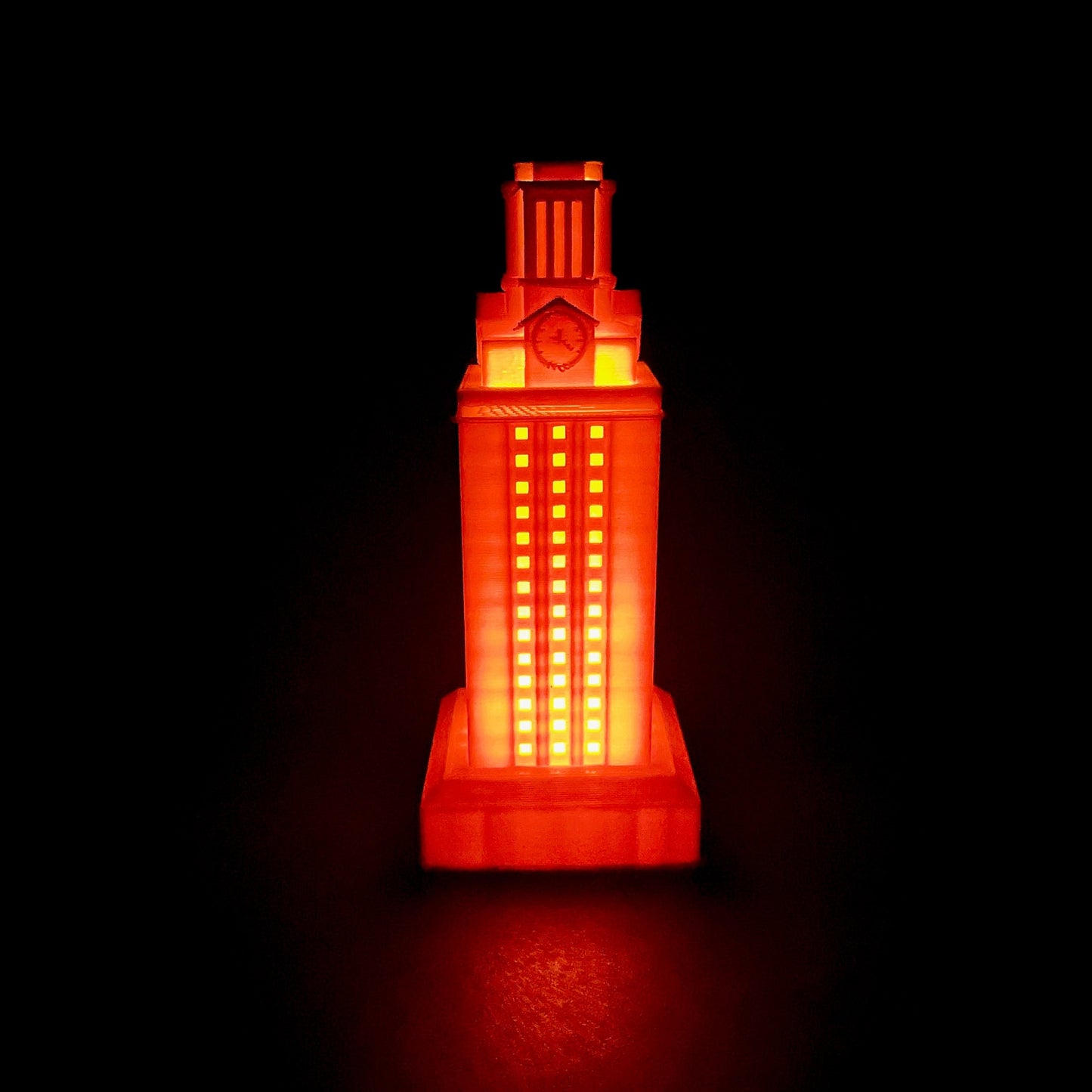 Front view of the University of Texas graduation gift--a light designed in honor of the UT Tower in burnt orange.