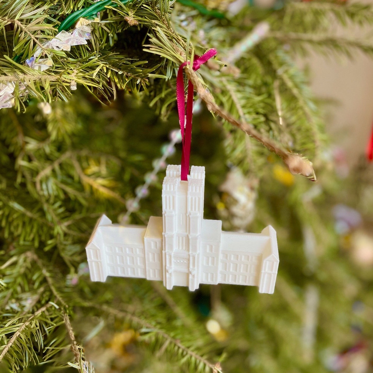 The Virginia Tech campus ornament, shown on a tree decorated for Christmas.