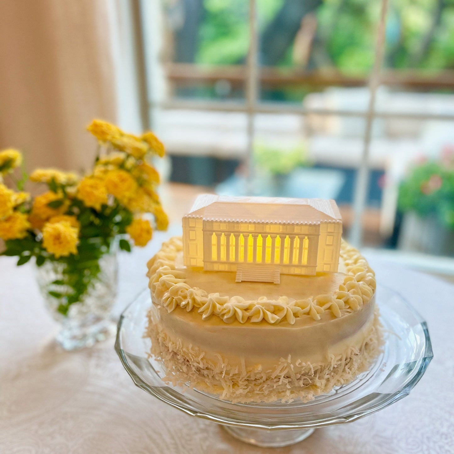 The Texas A&M light, shown in use as a Texas A&M cake topper on a Texas A&M graduation cake.