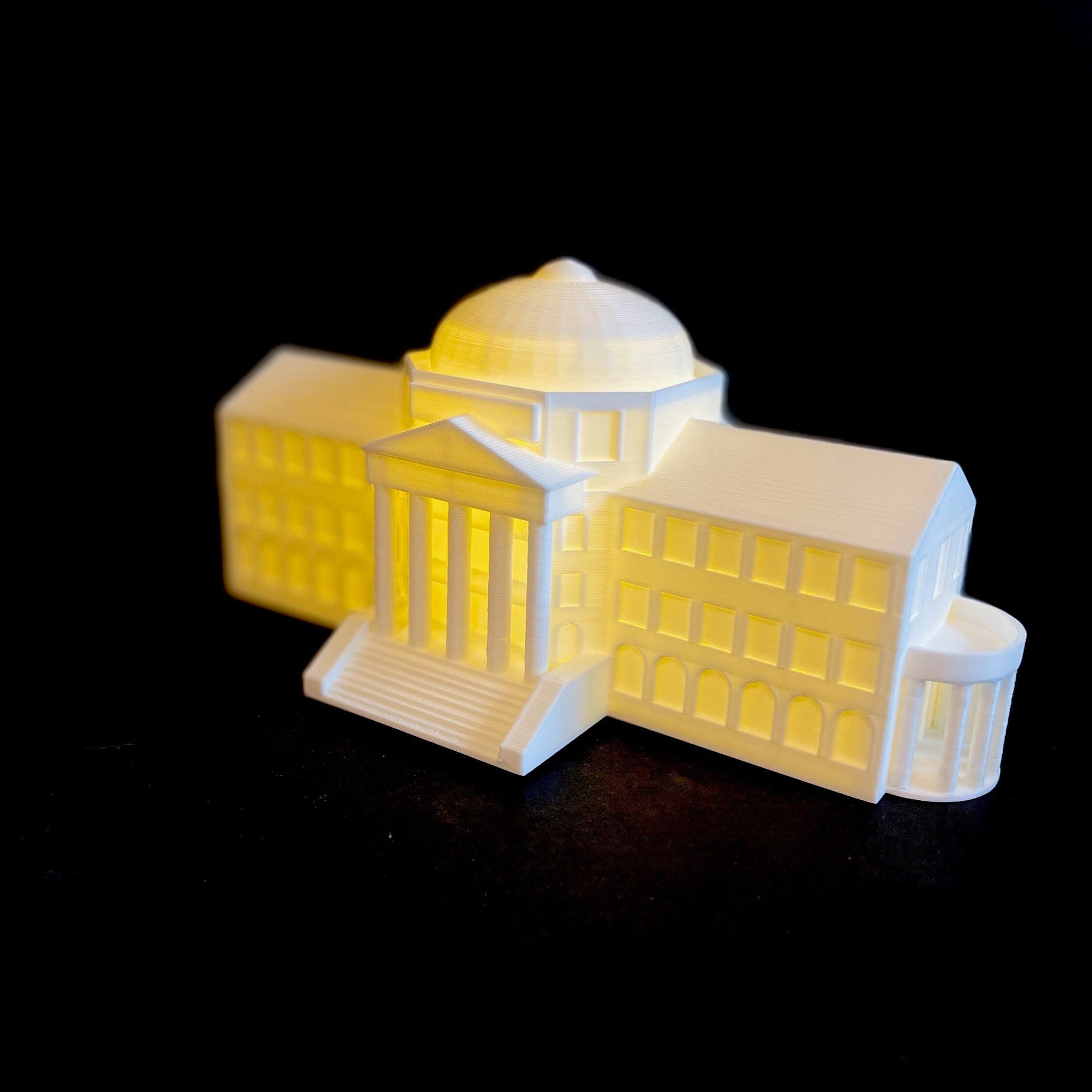 Side view of the lighted SMU Dallas Hall figurine.