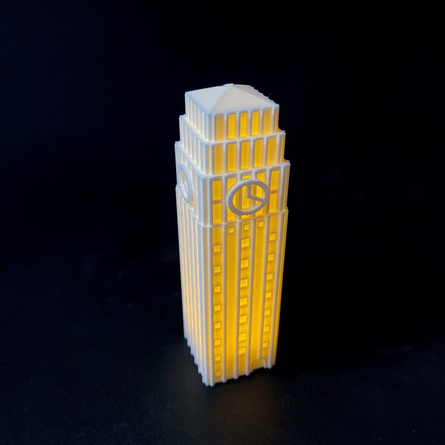 The University of Michigan lighted figurine of the Burton Memorial Tower.