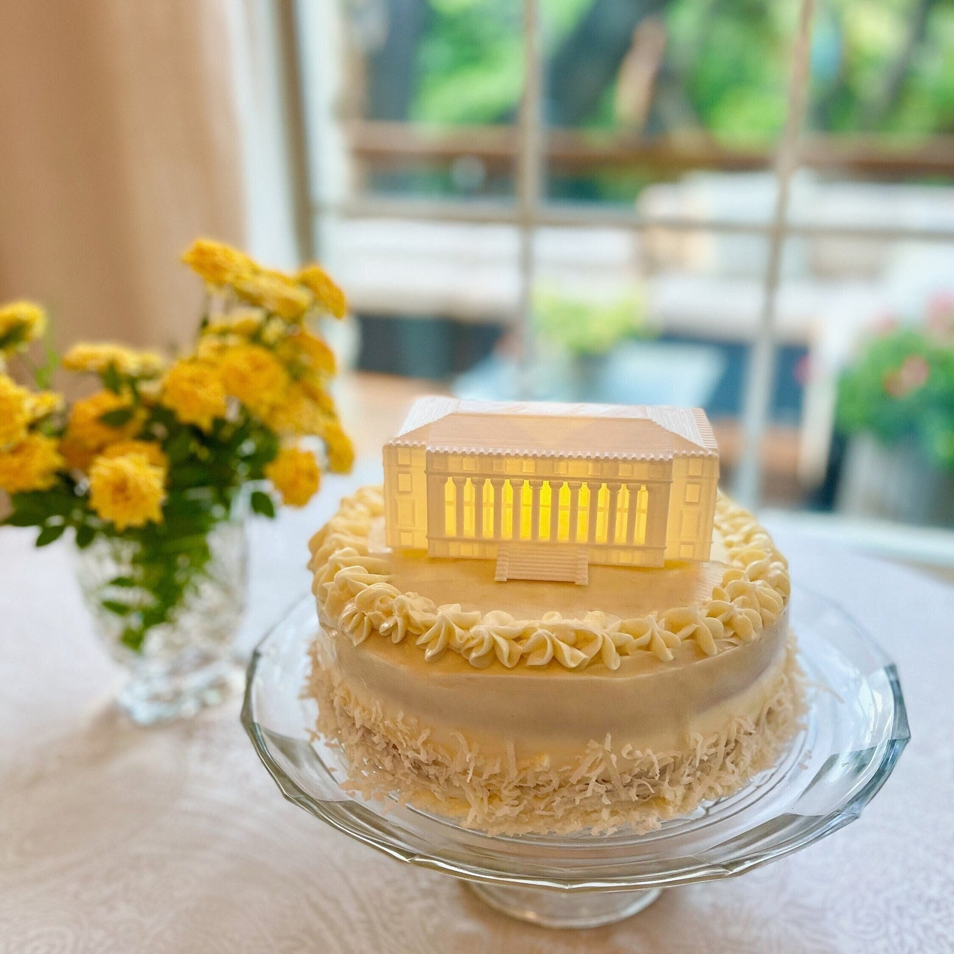 The Texas A&M cake topper with a light, shown on a Texas A&M graduation cake.