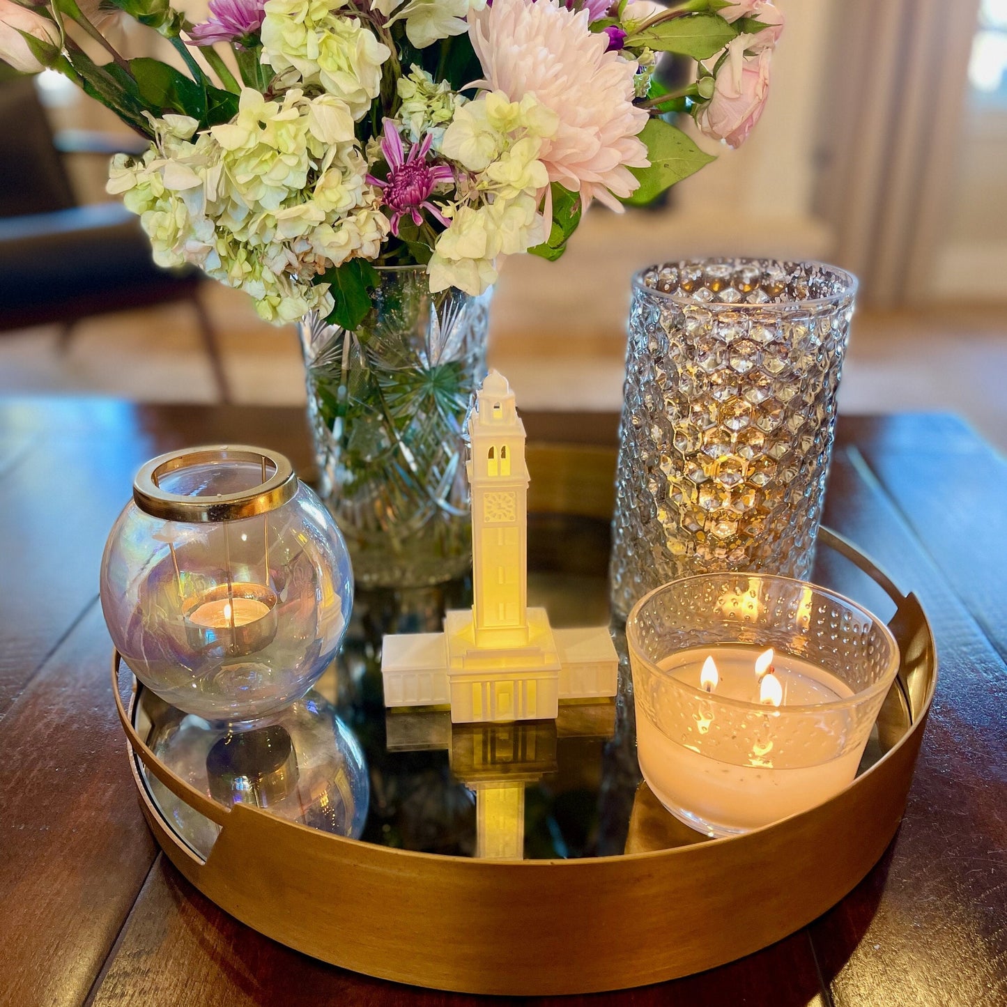 The LSU light, used as home decor and shown styled on a living room tray.