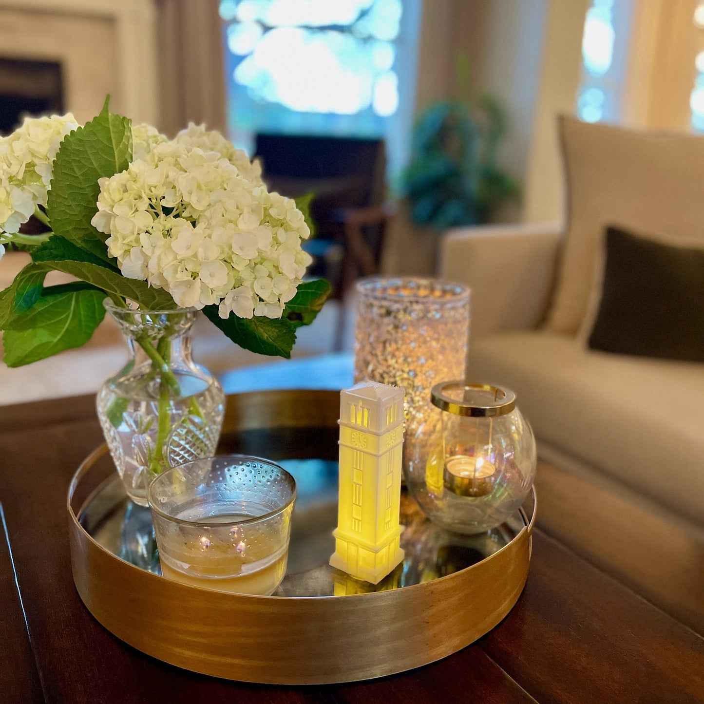 The unique NC State light, designed to look like the NC State Tower and displayed in a home.