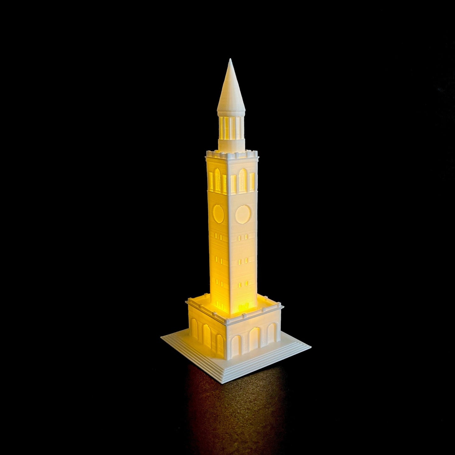 Closeup view of the lighted UNC Tower figurine.