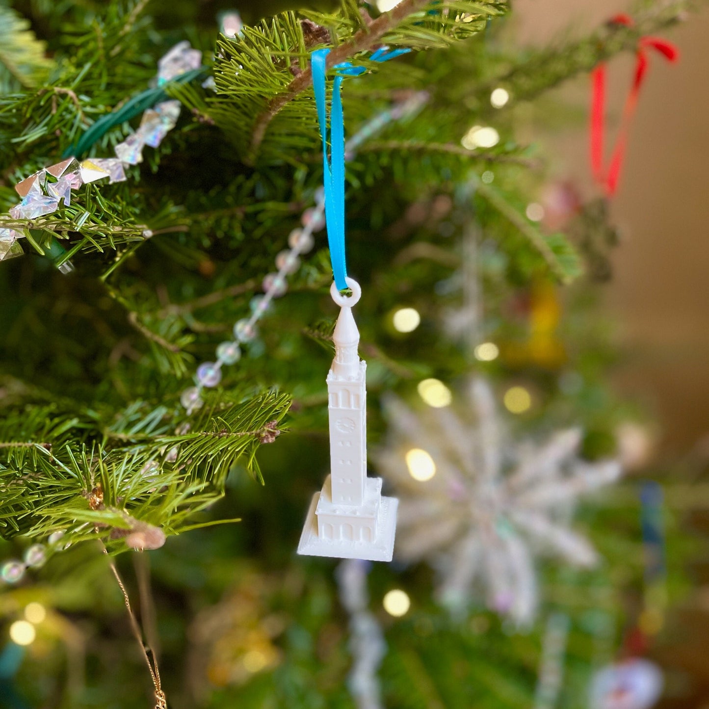 The UNC ornament, shown on a Christmas tree.