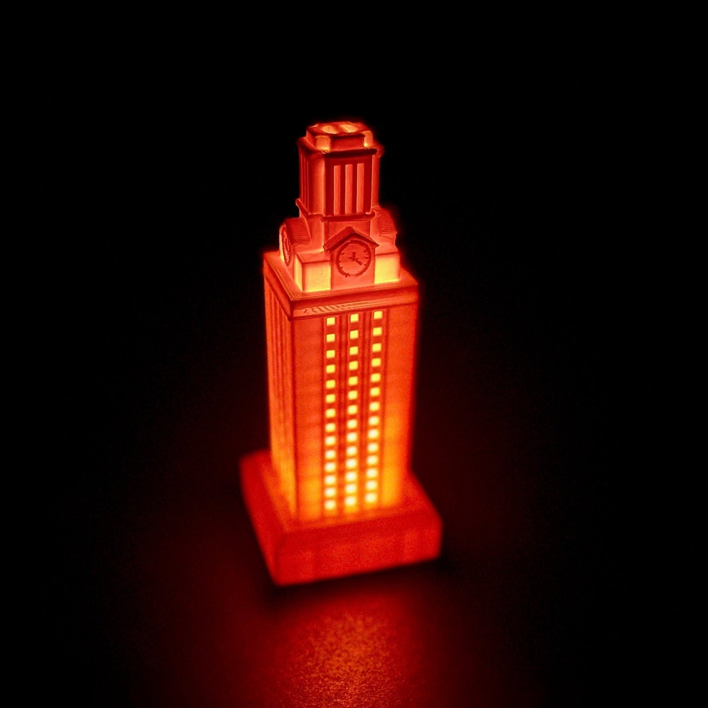 The University of Texas Tower lighted figurine in burnt orange.