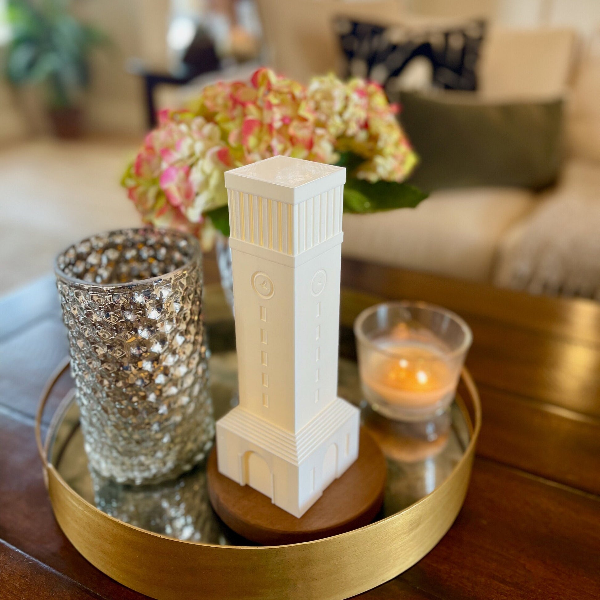 The Texas A&M dorm decor light, shown on a living room tray.