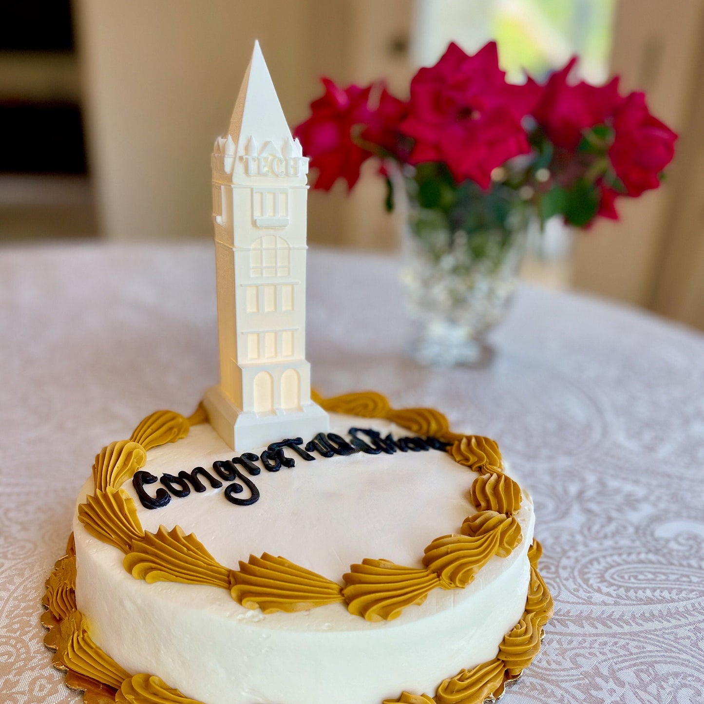 The Georgia Tech lighted cake topper, shown on a Georgia Tech graduation cake.