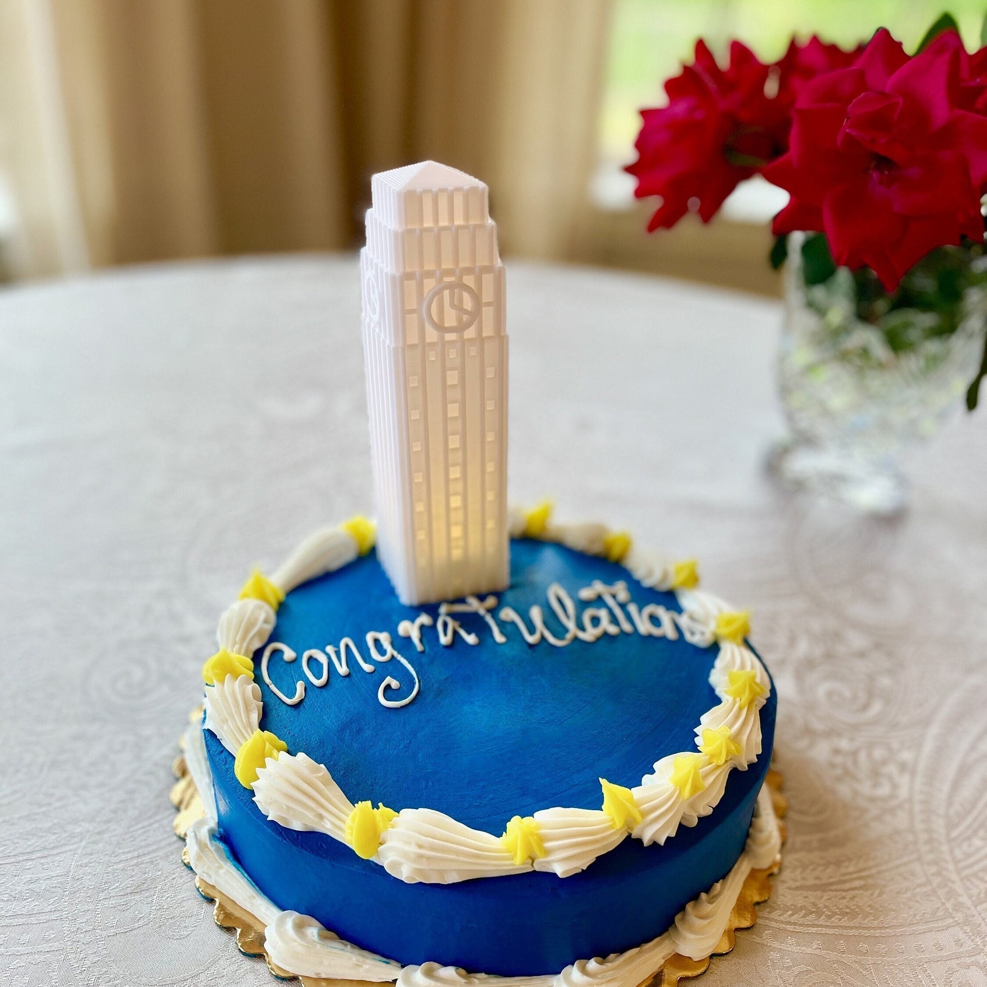 Lighted University of Michigan cake topper, shown on a Michigan graduation cake.