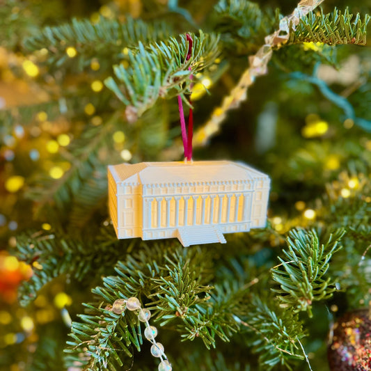 The Texas A&M lighted ornament, shown on a Christmas tree.