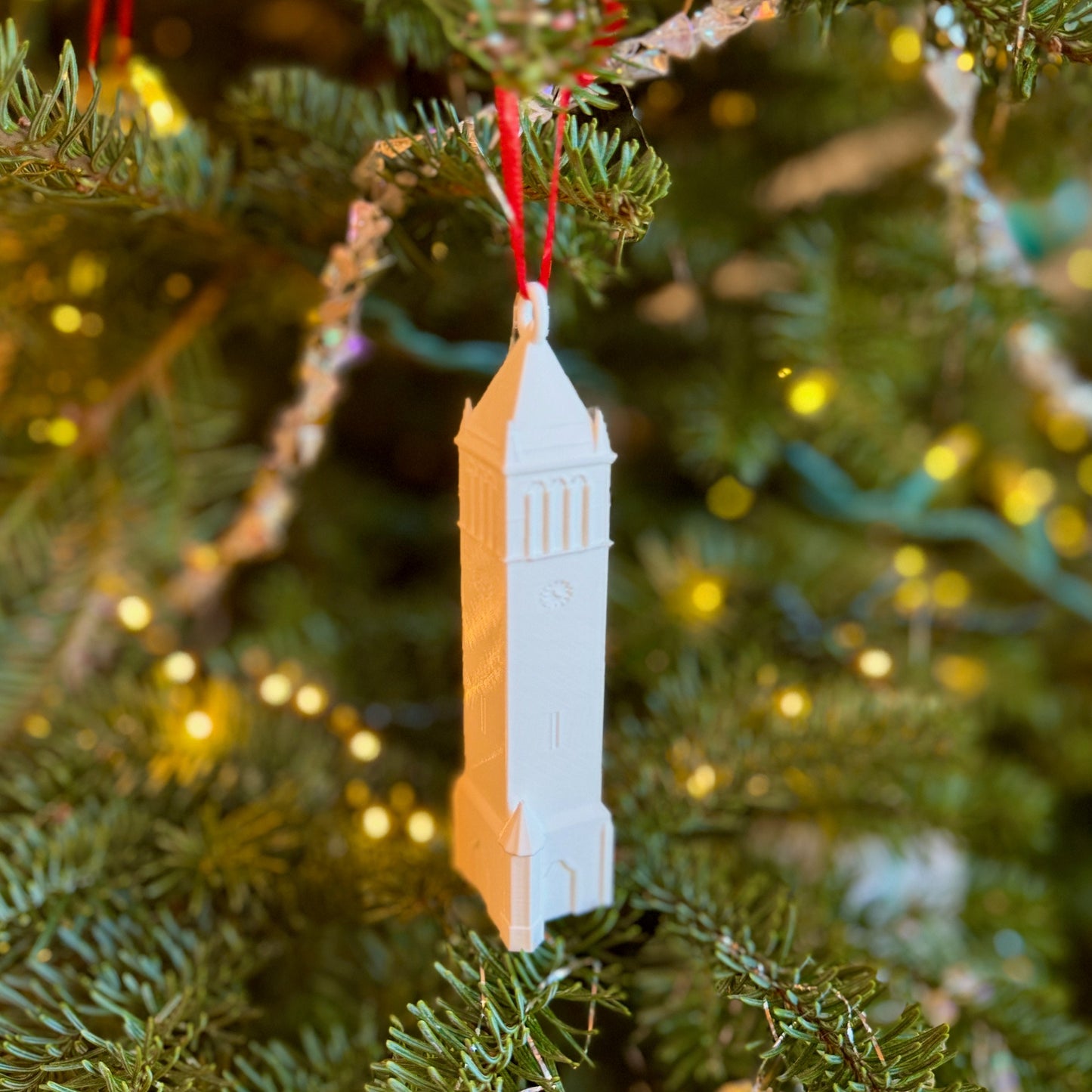 The 3D printed Iowa State ornament, designed as a replica of the ISU Tower.