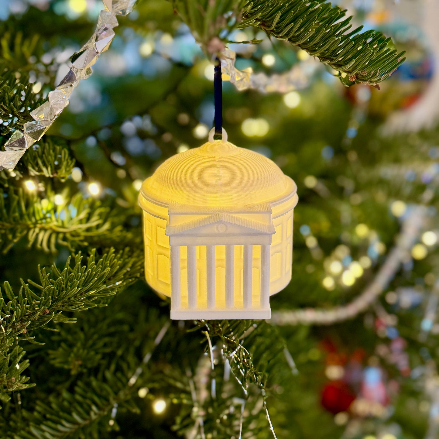 The UVA stocking stuffer ornament, designed to look like the UVA rotunda.