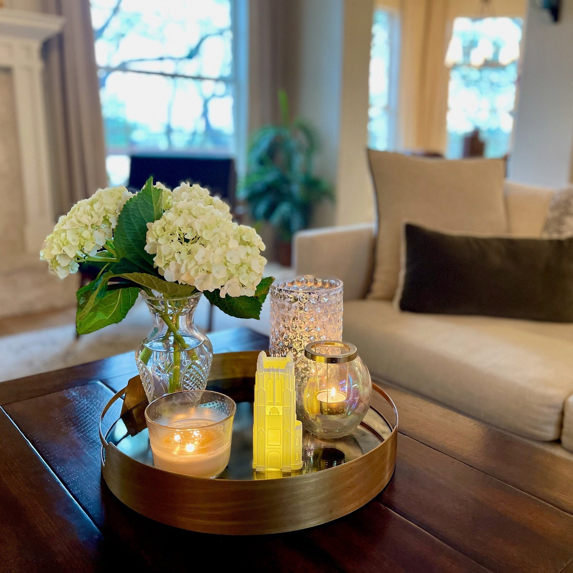 The Michigan State University home decor light, shown on a living room tray.