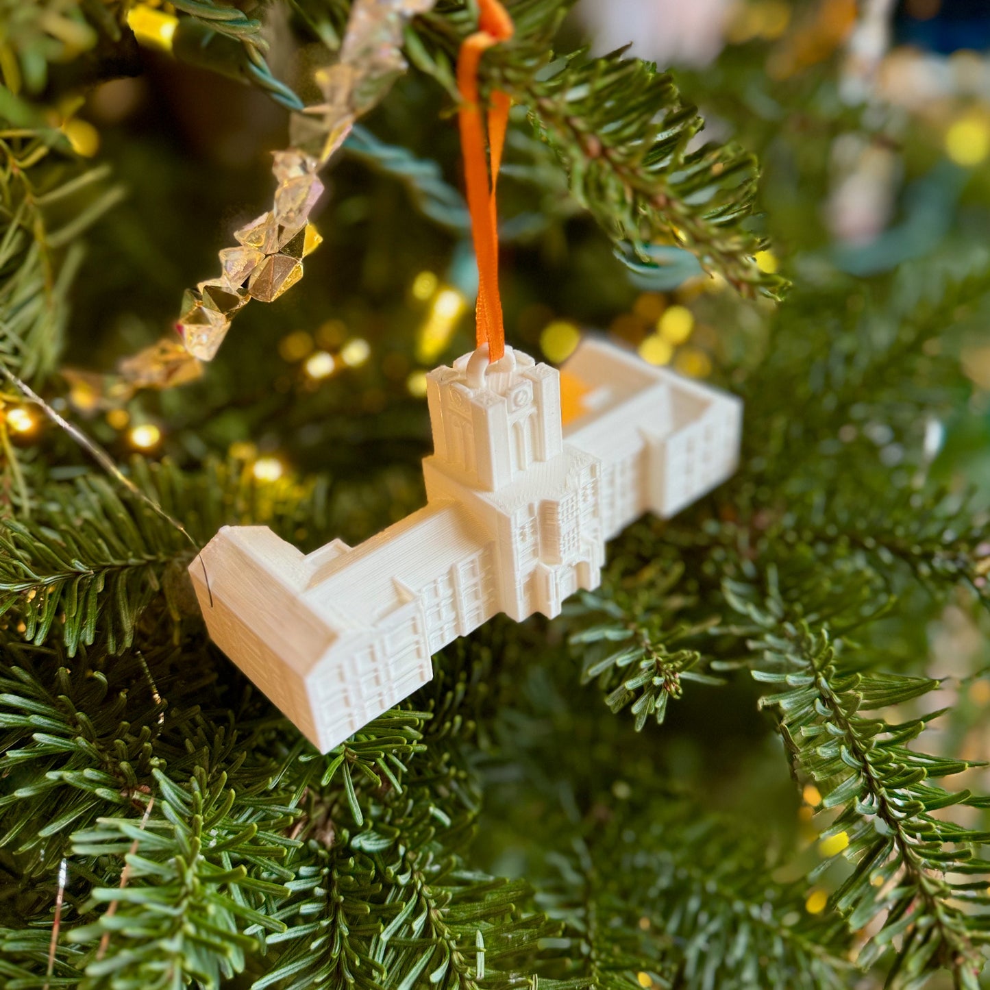 The University of Tennessee ornament depicting Ayres Hall and hung on a University of Tennessee tree.