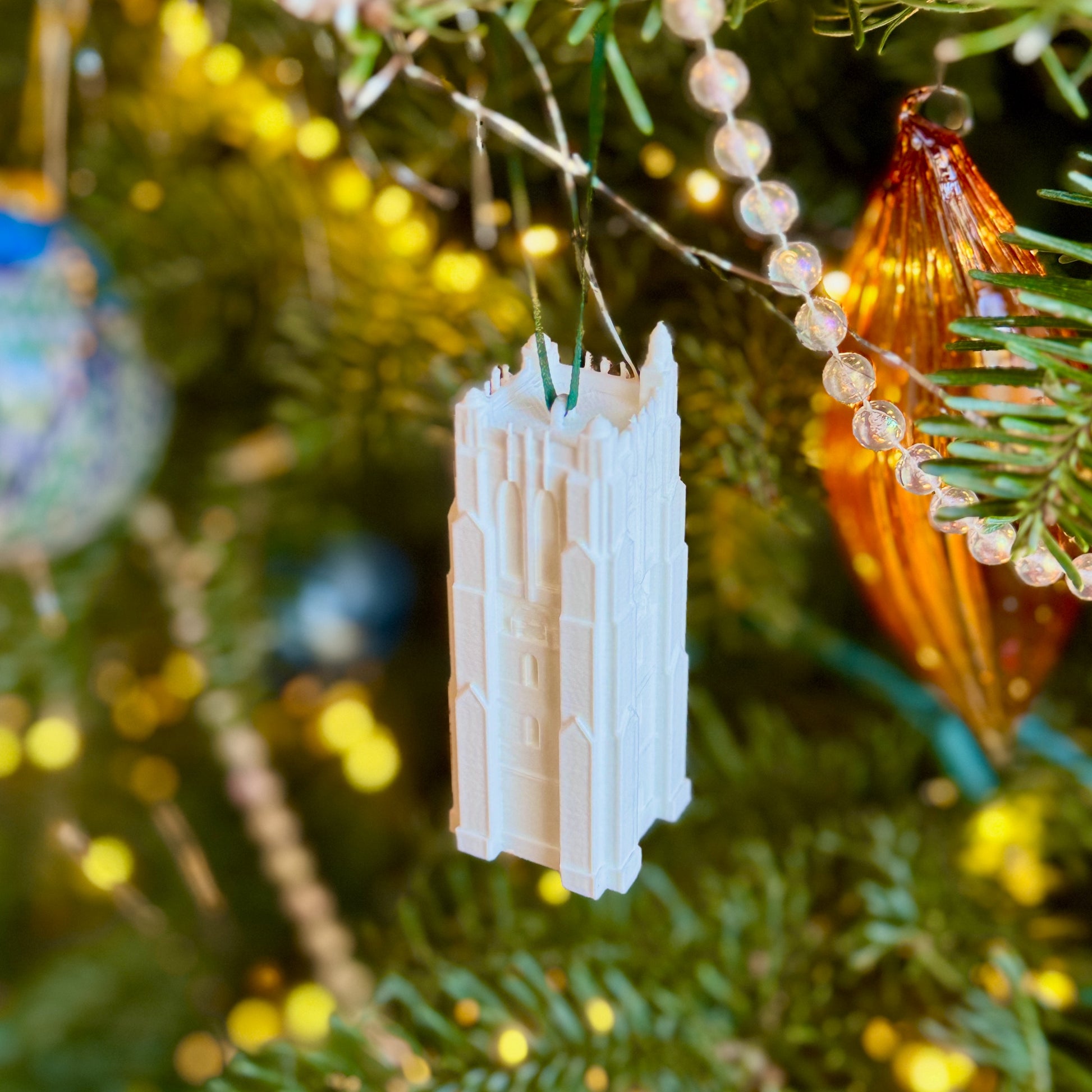 The MSU Spartans ornament, shown on a Christmas tree.