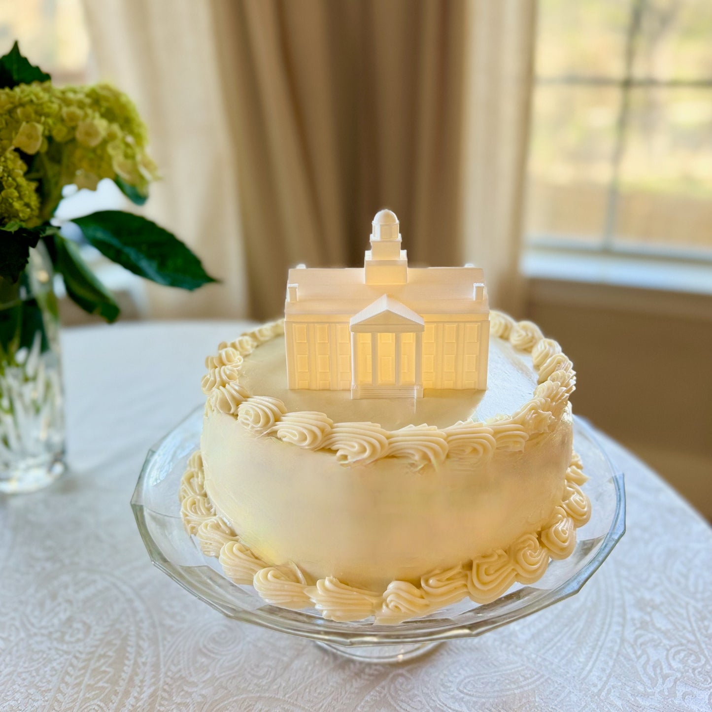 The Iowa Hawkeyes cake topper, shown on an Iowa graduation cake.